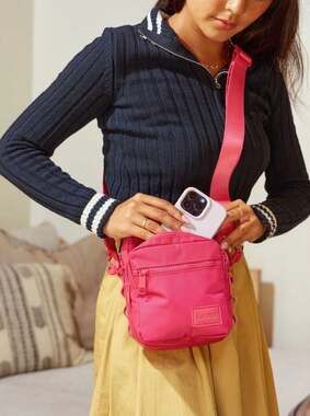 CALPAK Stevyn Mini Crossbody Bag in Dragon Fruit Pink